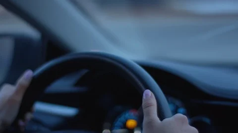Closeup Of Woman's Hands On Steering Wheel, Driving At Night Stock-Footage 85870406