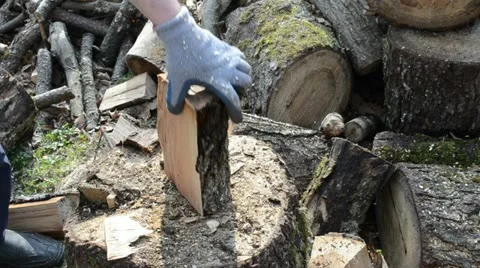 Closeup of wood chopping. man chop wood with axe Stock Footage
