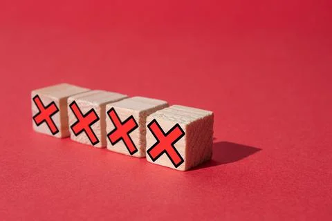 Closeup of the wooden blocks with cross marks. Stock Photos