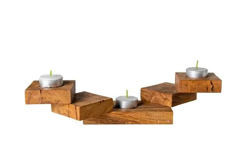 Closeup of a wooden textured rectangular candlestick for three candles isolat Stock Photos