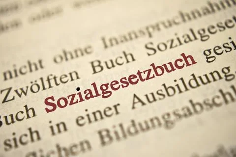 Closeup of the words "social code" written in red on the page Stock Photos