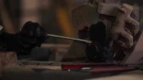 Closeup worker reassembles part using tools and lubricant Stock Footage 101046140
