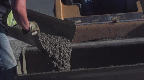 Closeup of worker using gloves to pour concrete Stock Footage 55147841