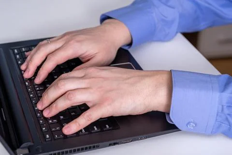 Closeup of a worker using a laptop computer Stock Photos