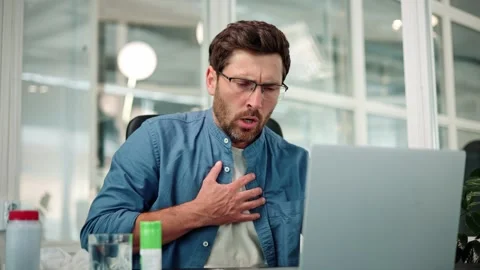 Closeup of working bearded man in glasses, difficulty breathing or chest pain. Stock Footage 247451172