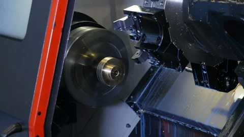 Closeup of working cnc lathe in the heavy industrial manufacturing facility Stock-Footage 116094028