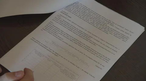 Closeup working papers, business man writing with pen, browsing paper, hard work Vidéo 42648094