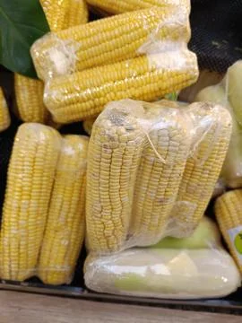 Closeup of wrapped peeled corn Stock Photos