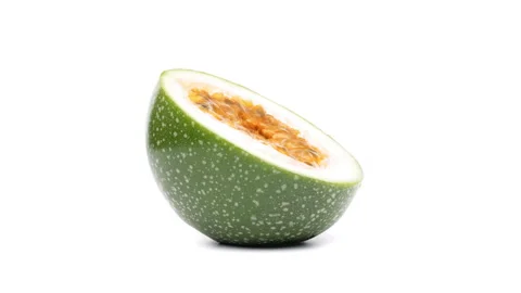 Closeup of a yellow passion fruit rotating. Isolated, white background. Stock Footage 159153701