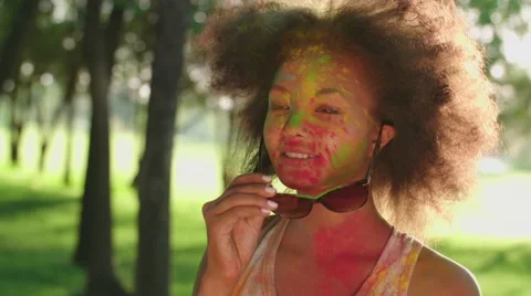 Closeup of young beautiful African American girl having fun in the Park with the Stock Footage