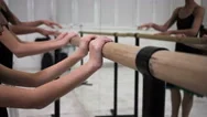 Closeup Of Young Girls` Small Hands Doing Excercise During Group Ballet Training Stock Footage