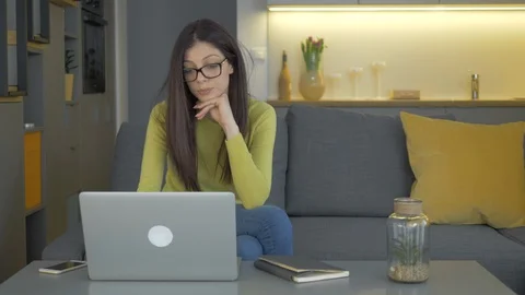 Closeup Of A Young Lady Working From Home And Getting Bored Stock Footage 128366209