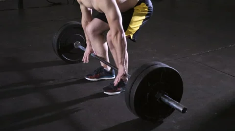 Closeup of young man doing deadlift workout at the gym Stock Footage 65279869