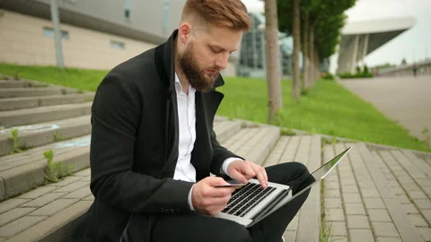 Closeup young man hands holding credit card and using computer laptop online Stock-Footage 134606328