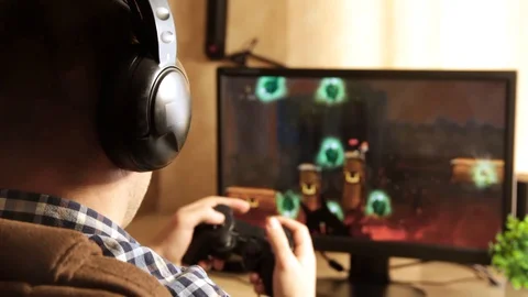 Closeup of young man hands playing video games on gaming console in front 스톡 동영상 129666343