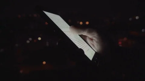 Closeup of young man hands scrolling pictures on phone screen Stock Footage 83425867