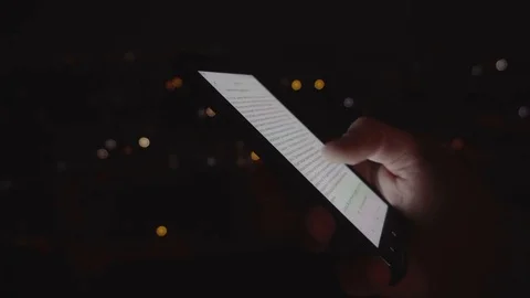 Closeup of young man hands scrolling pictures on phone screen Video stock 83531979