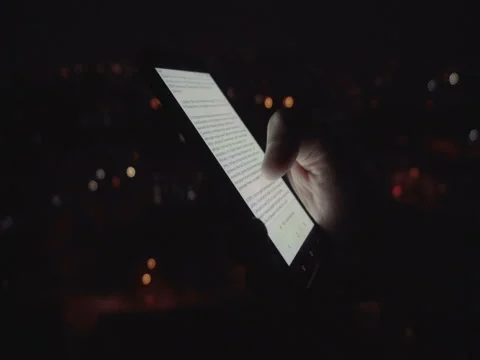 Closeup of young man hands scrolling pictures on phone screen Stock Footage 83610153