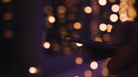 Closeup of young man hands typing sms scrolling pictures phone Stock Footage 73840945