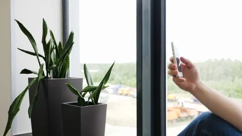 Closeup of young man hands typing sms scrolling pictures phone. handsome man Stock Footage 82113775