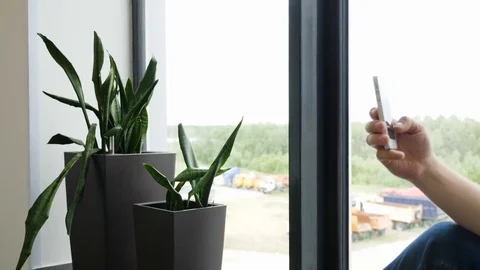 Closeup of young man hands typing sms scrolling pictures phone. handsome man Stock Footage 82114452