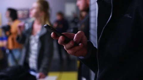 Closeup of young man hands typing sms scrolling pictures phone. HD. 1920x1080 Stock Footage 89206266