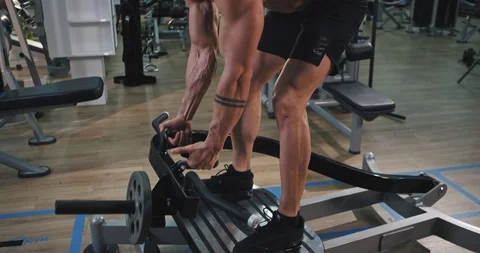 Closeup young man have a workout at gym concentrated doing well the exercises Stock Footage 115938852