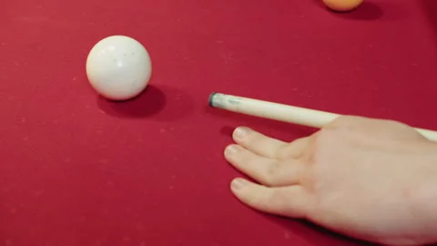 Closeup young player forming bridge on table with white cue ball Video stock 329192783