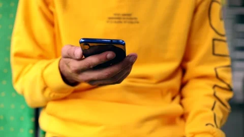 Closeup of young stylish man hands using smartphone mobile in bus. Navigation ap 스톡 동영상 135520800