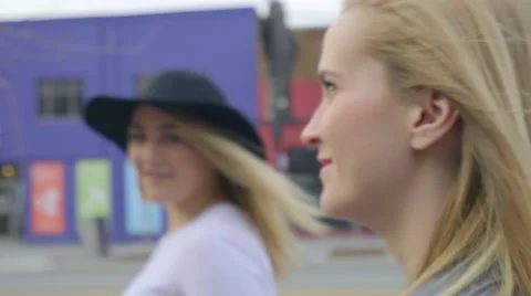 Closeup Of Young Woman's Face As She Walks Down Sidewalk, With Her Friend Stock Footage 62512441