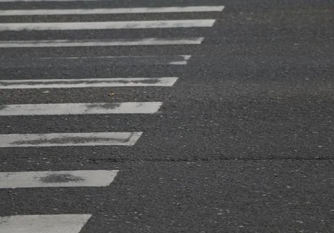 Closeup of the zebra road pattern. Stock Photos