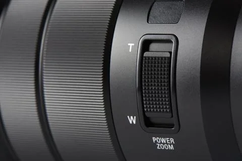 Closeup of zoom button on a digital camera lens Stock Photos