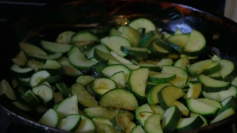 Closeup of zucchini cooking in a pan Stock Footage 93199085