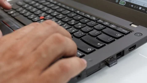 Closeups of scientists and programmers while typing on keyboard or using a Video stock 92665361