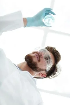 Closeup.scientist holding beaker with the sample Foto stock