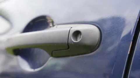 Closing and locking car door close up on handle 4k 스톡 동영상 153885113