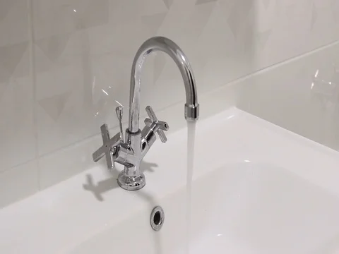 Closing the Bathroom Cross Mono Basin Sink Mixer Stock Footage 125802329
