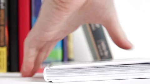 Closing a Book and Returning it to the Bookshelf, End of Study Stock Footage 318741116