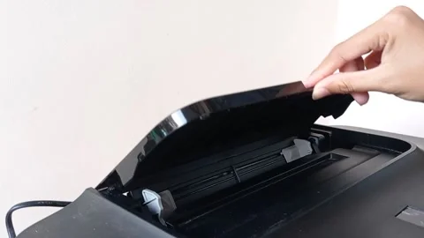 Closing a casing black printer Stock Footage 146248556