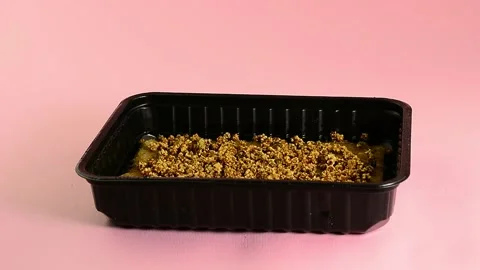 Closing the container with a micro-seeded plastic lid Stock Footage 132962293