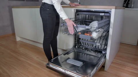 Closing the dishwasher and pressing start Stock Footage 65018515