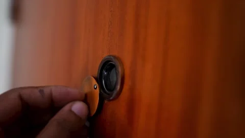 Closing the door hole by hand Stock Footage 293515214