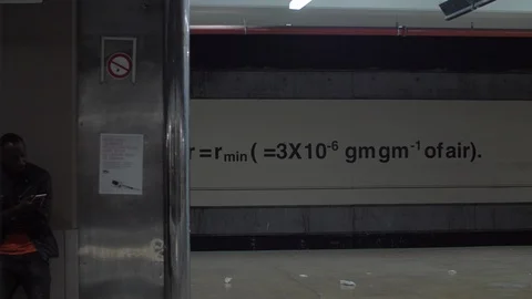 Closing doors of subway train, view to global warming equation in Paris metro Stock Footage 91089288