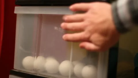 Closing drawer with ping pong balls Stock-Footage 10901492