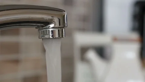 Closing the flowing water Stock Footage 93485642