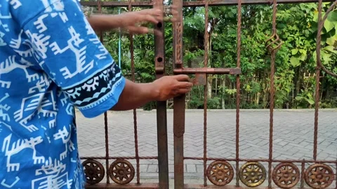 Closing the iron gate Stock Footage 204996984