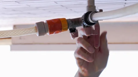 Closing the irrigation tap Stock Footage 108773457