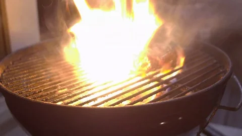 Closing lid of a burning barbecue 스톡 동영상 74111444