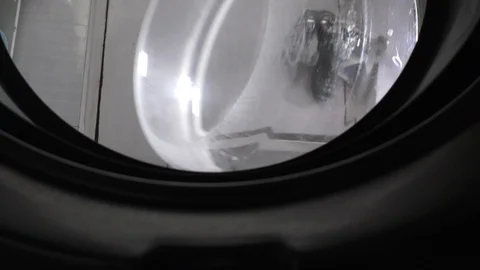 Closing the lid of washing machine Stock Footage 128199398