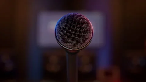 Closing Up To A Microphone In A Studio Stock Footage 165223496